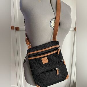 Stone Mountain black and tan crossbody bag